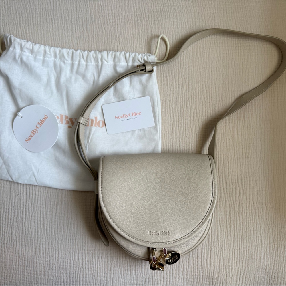 See By Chloe Ivory Cream Crossbody Saddle Bag with Charm